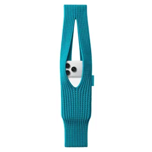 Long knit phone bag detail view, vibrant blue ribbed texture fashion accessory for daily use.