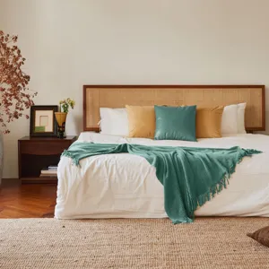 Green knitted throw blanket for couch bed living room with waffle texture and fringe