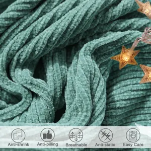 Close-up detail of green ribbed knit blanket showcasing soft corduroy texture and cozy touch.