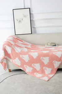 Pink cute ghost throw blanket for cozy home decor, soft knit plush fuzzy blanket detail view.