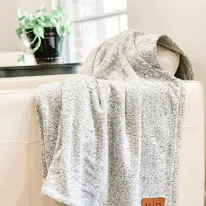 Cozy knit throw blanket for autumn and winter, soft solid color couch blanket for home decor.