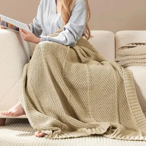 Beige knitted throw blanket for couch sofa, cozy soft diagonal stripe blanket for home office.