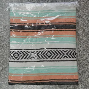 Mexican style geometric fringe woven blanket, colorful striped beach towel and cozy picnic yoga mat.