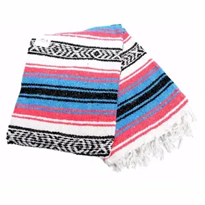 Close-up detail of the woven Mexican blanket showing colorful stripes and fringe texture.