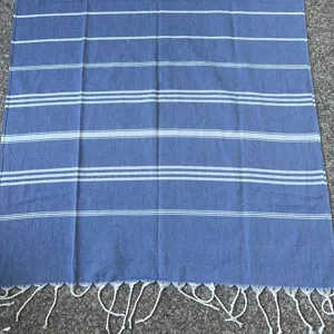 Turkish style striped beach towel woven cotton blanket with tassels for outdoor and bath use.