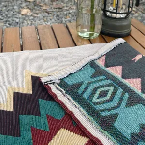 Bohemian woven jacquard camping blanket detail showcasing intricate geometric patterns.