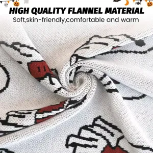 Soft knit throw blanket with Snoopy ghost pattern, perfect cozy flannel material for autumn.