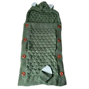 Knitted baby sleeping bag with cute hood and wooden buttons, anti-kick swaddle blanket.