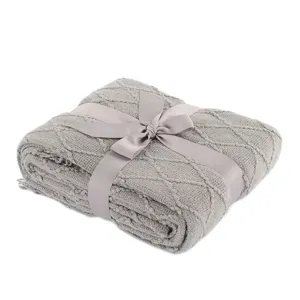 Grey knitted throw blanket with satin ribbon, ideal for home decor, sofa and bed use.