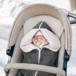 Detailed view of the knitted baby sleeping bag with soft sherpa lining for stroller use.