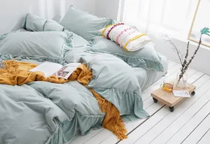 Nordic solid color bedding set with ruffles and yellow knitted throw blanket for cozy bedroom decor.
