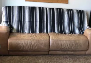 Black and white striped Mexican blanket throw, woven tassel serape for sofa decor and picnic.
