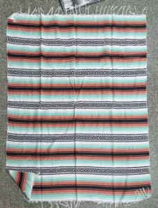 Woven Mexican blanket serape striped outdoor beach picnic blanket throw with fringe.