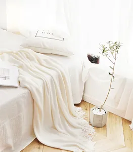 Nordic solid color knitted throw blanket with tassels, cozy soft bed and sofa cover.