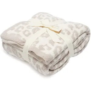 Cozy leopard print plush fleece blanket with ribbon bow for couch bed living room decor soft warm