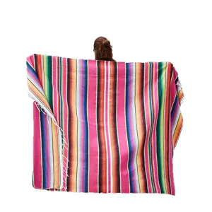 Traditional Mexican striped Serape blanket, colorful ethnic table runner and throw rug.