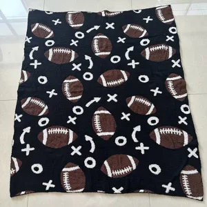 Morbida coperta in maglia nera con motivo di football americano, plaid accogliente per divano.