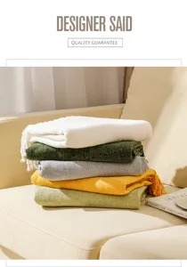 Cozy knitted throw blanket detail view, soft couch blanket for living room decor and warmth.