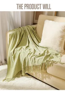 Green knitted throw blanket with fringe for sofa couch and living room cozy decor