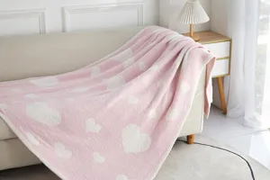 Cozy pink microfiber heart pattern blanket detailed scene view for home warm bedroom decor use.
