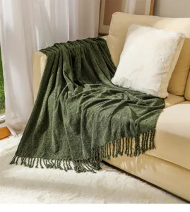 Dark green throw blanket with fringe for sofa, cozy chenille knit blanket for living room decor.