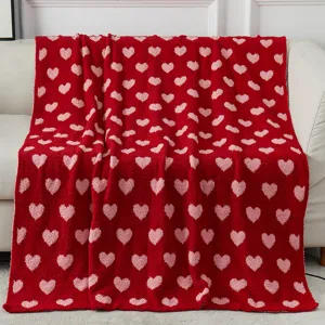Red microfiber blanket with pink heart pattern, cozy soft throw for Valentine day gift home.