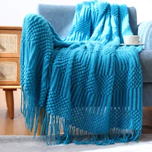 Nordic knitted throw blanket with tassels, cozy blue sofa blanket for living room home decor.