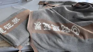 Couverture jacquard en tricot de pur coton motif géométrique douce et confortable pour canapé