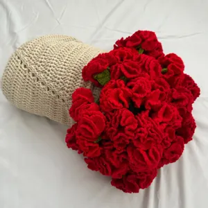 Handmade crochet rose flower bouquet blanket detail view, cozy knitted decorative throw.
