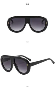 Black thick frame sunglasses with gradient lenses and stylish metal decor details.