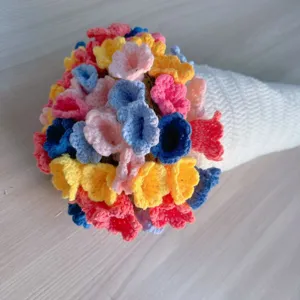 Handmade crochet flower bouquet blanket soft colorful knitted floral throw gift warm cozy.