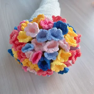 Handcrafted crochet flower bouquet blanket, colorful wool knitted floral gift home decor item.