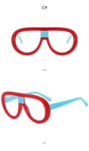 Details of stylish retro oversized fashion sunglasses featuring red frame and blue accents.