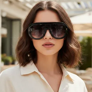 Oversized retro black frame sunglasses with chic metal rivet accents for women outdoor travel.