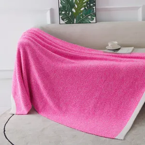 Soft and cozy pink knitted blanket for home decor, thick fluffy throw blanket for sofa and bed.