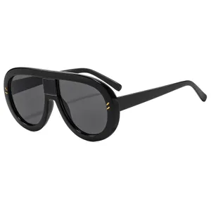 Oversized black round sunglasses for women and men, retro pilot frame with gold metal accents.