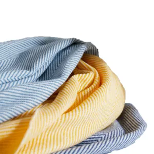 Woven herringbone throw blanket, blue and yellow acrylic decorative couch blanket for home use.