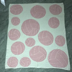 Plush knit blanket with pink ball pattern, soft feather yarn throw blanket for cozy home use.