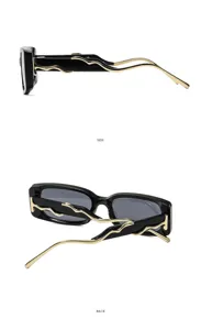 Retro Quadratische Sonnenbrille für Damen und Herren, schwarzer Rahmen mit goldenem Wellenmuster.