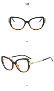 Modische Strass Katzenauge Sonnenbrille mit schwarzem und Schildpatt-Rahmen für Damen.