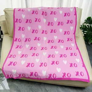 Pink knit blanket with XOXO and heart pattern, soft microfiber Valentine's day throw blanket.