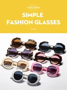 Gafas de sol redondas geométricas de moda con monturas metálicas y de acetato elegantes.
