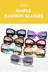 Gafas de sol cat-eye grandes para mujer, de moda con lentes degradadas y leopardo colorido.