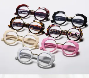Gafas redondas de moda anti luz azul con diseño de montura geométrica irregular para mujeres.