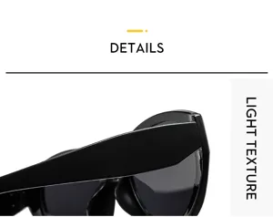 Detailed close-up of stylish black cat-eye sunglasses frame and smooth temple texture.