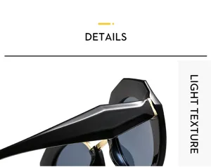 Gafas de sol redondas de moda para mujer con monturas negras y detalles dorados de lujo.