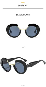 Elegantes gafas de sol redondas irregulares para mujer con puente metálico dorado y protección UV.