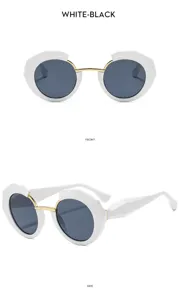 Gafas de sol geométricas elegantes para mujer, montura blanca con puente dorado y lentes.