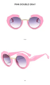Gafas de sol de montura poligonal rosa de moda con lentes degradadas para mujer.