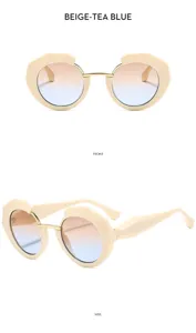 Gafas de sol redondas de moda con monturas beiges y lentes degradadas en azul té.